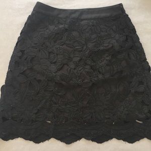Black cutout layered skirt by Cynthia Rowley
